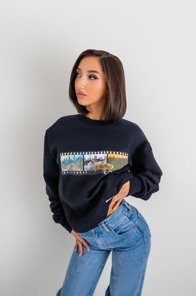 Girl Wearing Black Sweatshirts With Artwork