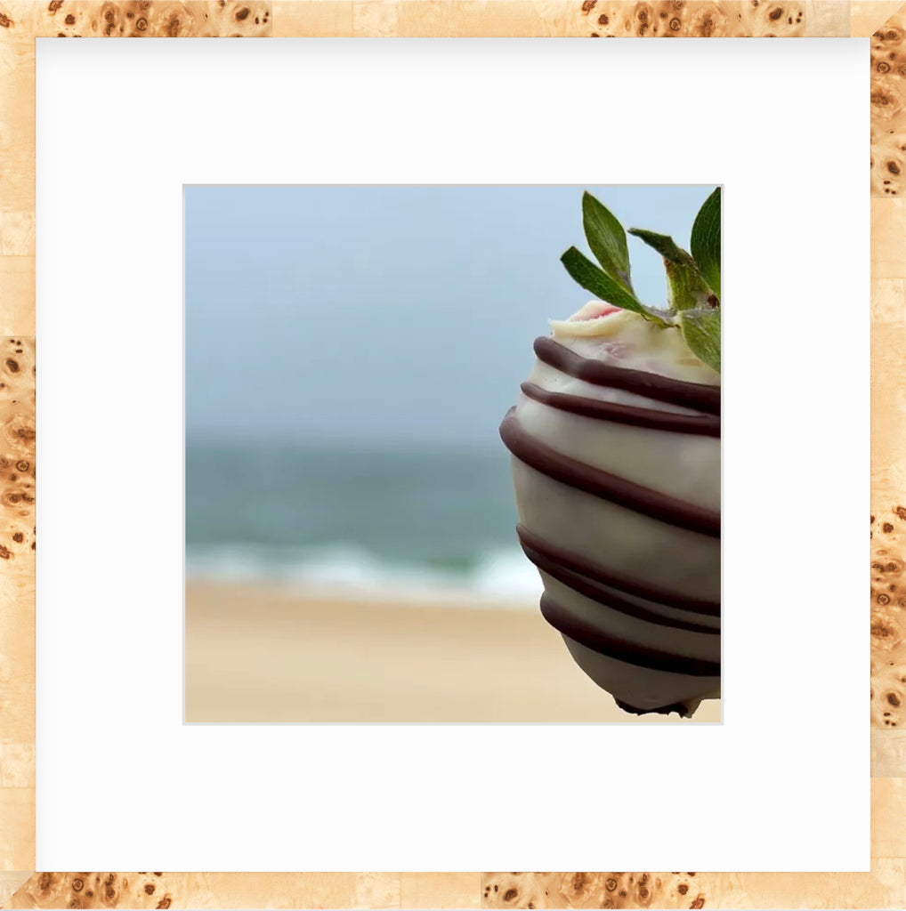 Framed Picture Of A Chocolate Covered Strawberry In Front Of A Beach View