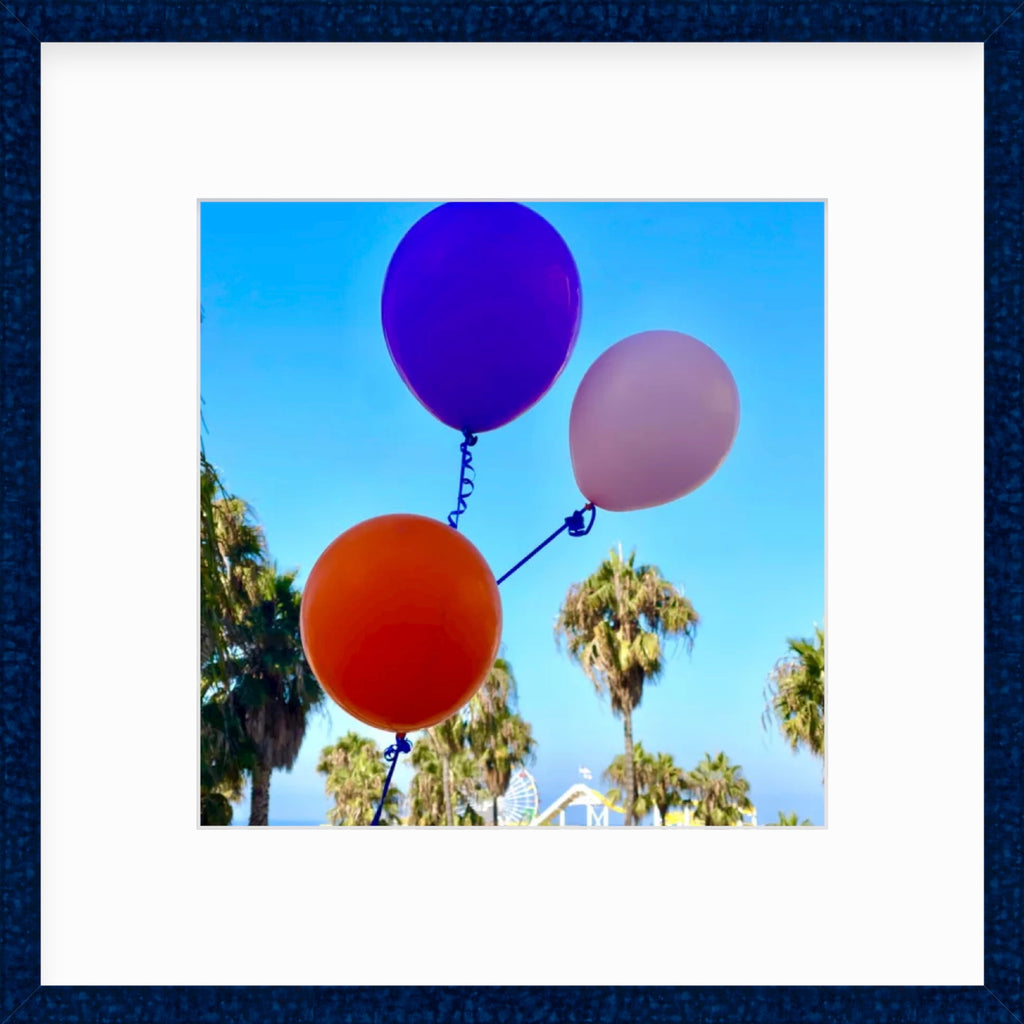 Framed Picture Of Balloons In Front Of Palm Trees
