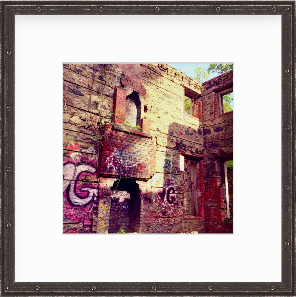 Framed Picture Of Graffiti On Abandoned Brick House