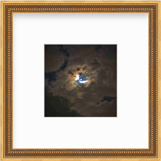 Framed Picture Of The Moon Behind Clouds