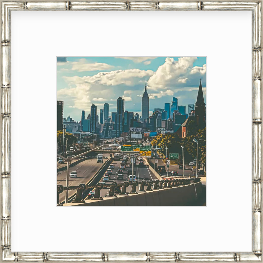 Framed Picture of New York City Behind Traffic