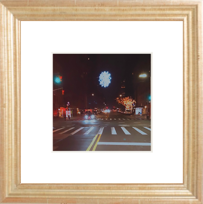 Framed Picture Of A Firework In Night Sky Above A Street