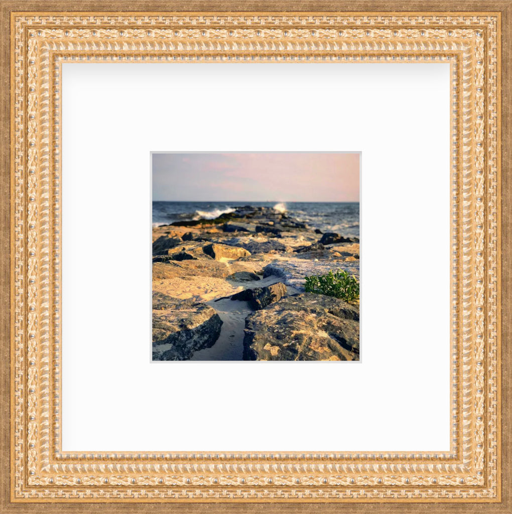 Framed Picture Of Beach Rocks Jutting Into Ocean Water
