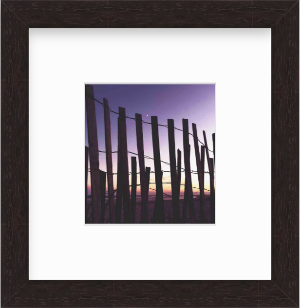 Framed Picture Of A Wooden Fence In Front Of A Sunset 